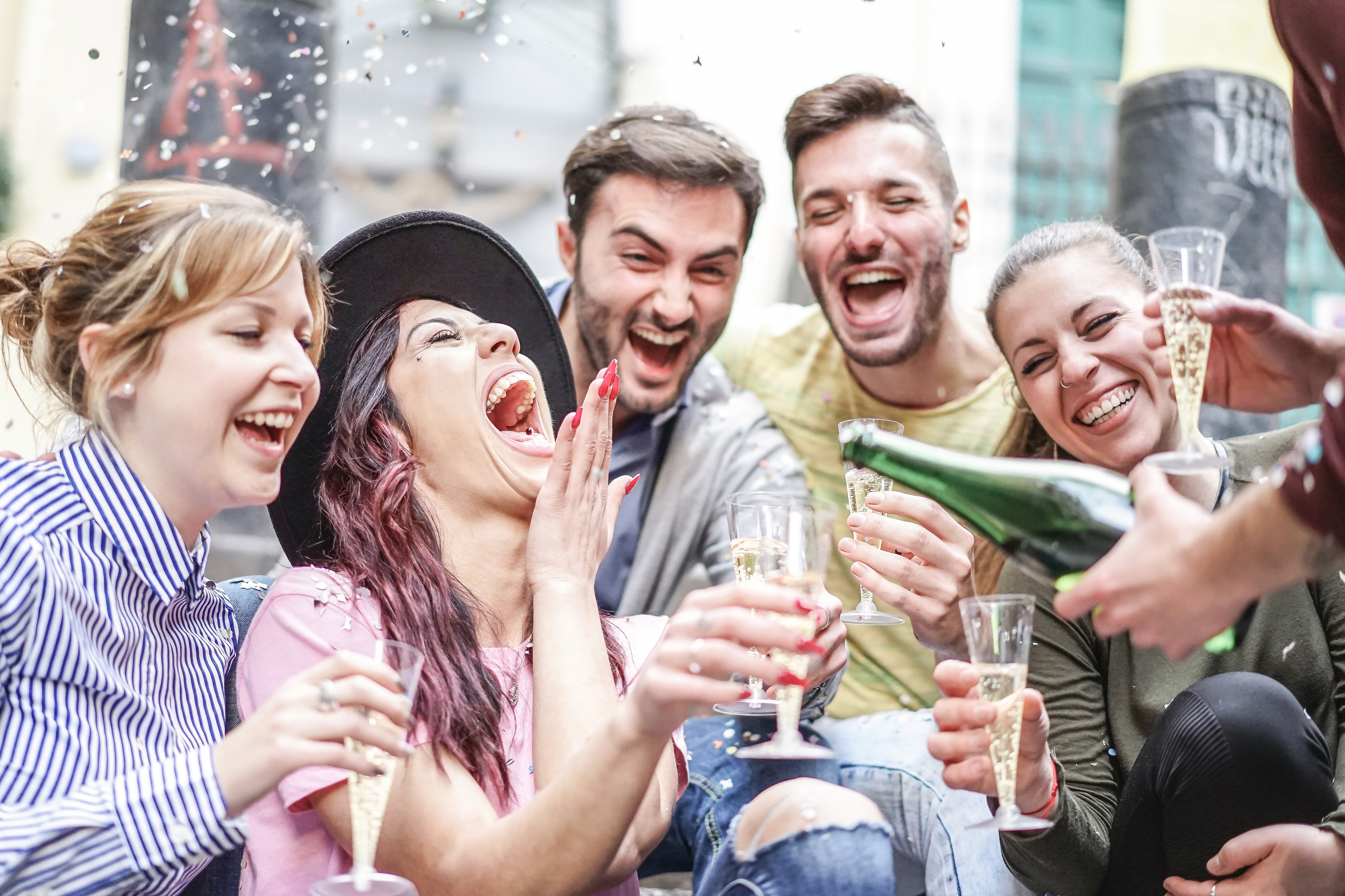 young_people_laughing_with_prosecco.jpg
